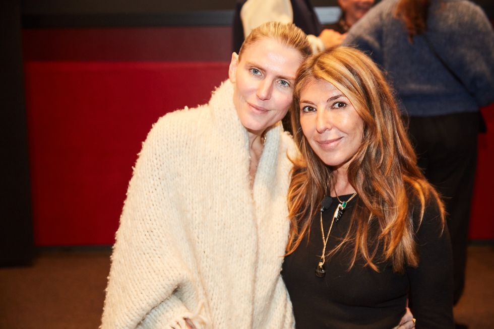 a woman posing with a woman